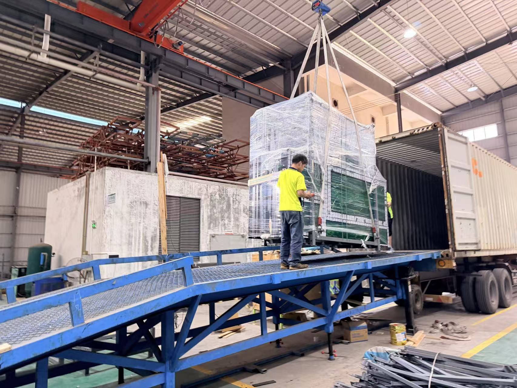Packed façade units being loaded for shipment