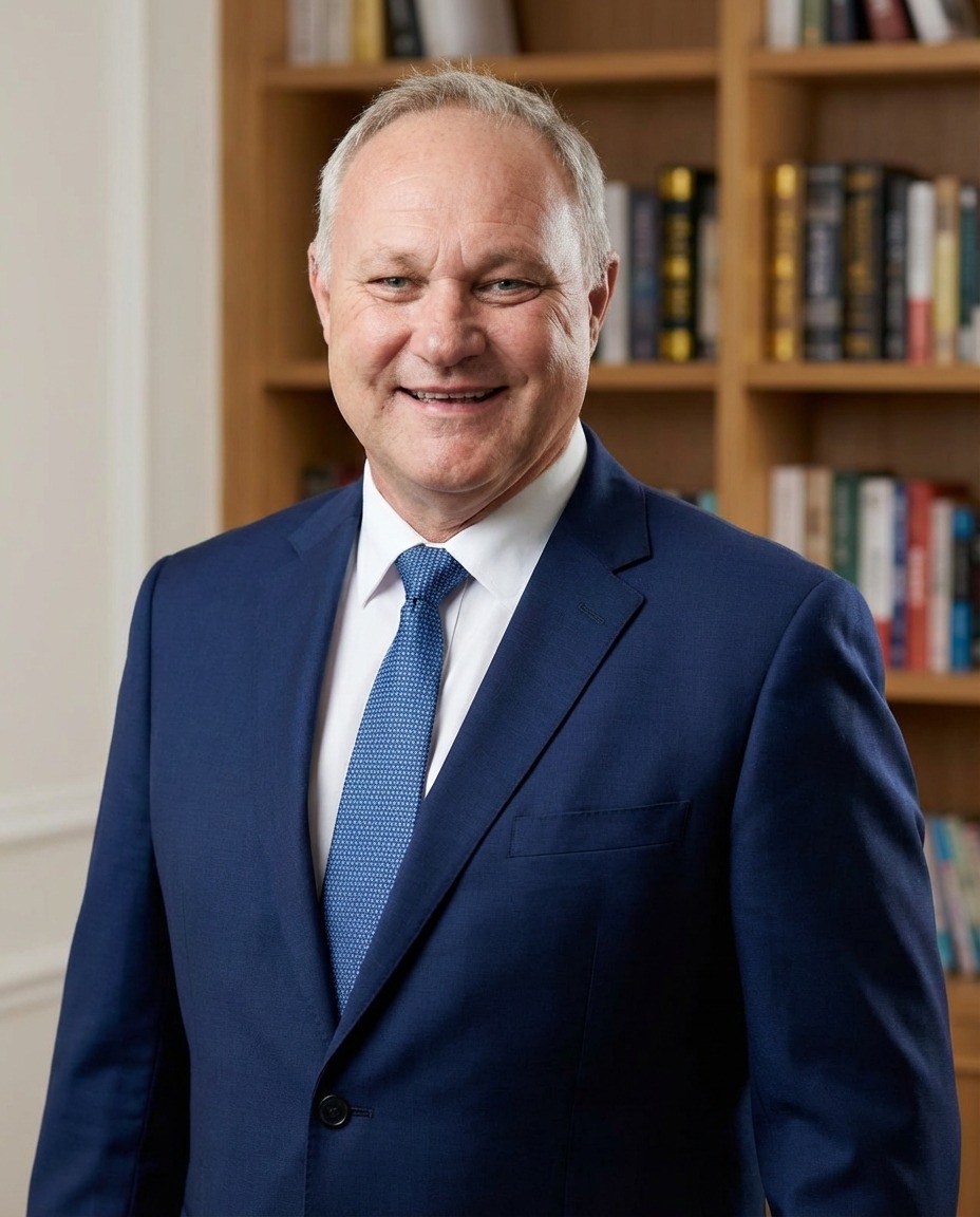 Peter Collishaw, Managing Director, in a navy suit