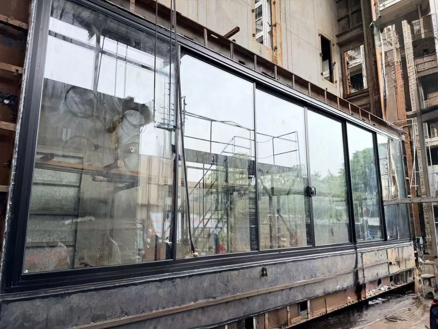 Aire glazed door assembly mounted in the test rig